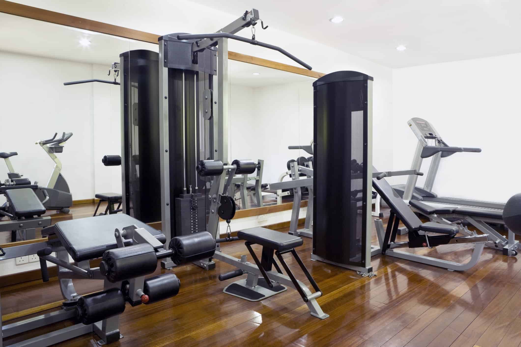 Interior of sport club with equipments- Gym Interior Painting